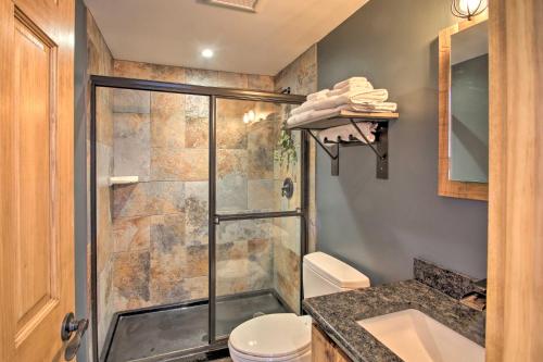 A bathroom at Ski-InandOut Burke Mtn Condo with Amenity Access!