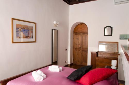 Cama o camas de una habitación en Borgo Pio 91