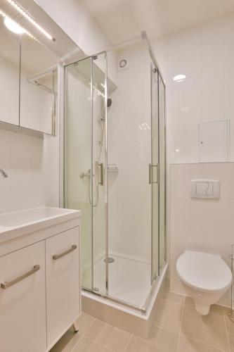 Een badkamer bij Apartament Aleksander