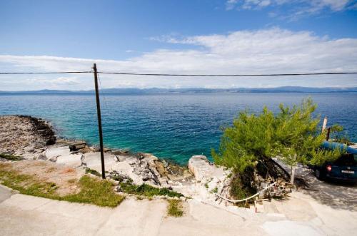 a view of a body of water with a pole at Apartment Barba in Rogač