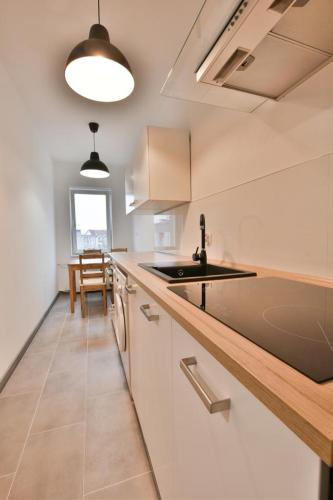 Een keuken of kitchenette bij Apartament Aleksander