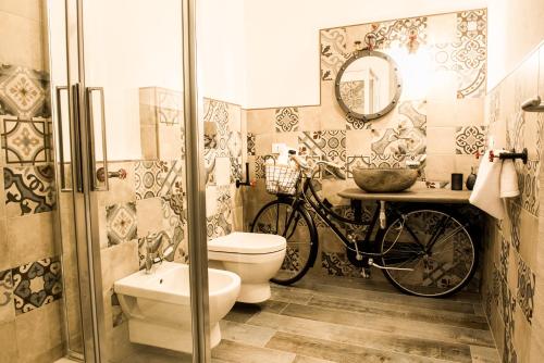 Phòng tắm tại In Dommo de Tziu Franziscu e de Tzia Elene