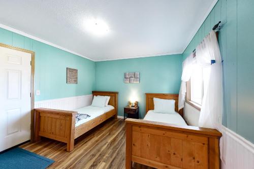 Ένα ή περισσότερα κρεβάτια σε δωμάτιο στο Cape Meares Retreat