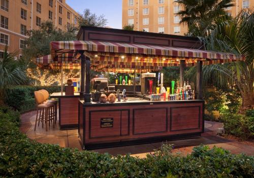 a bar in the middle of a garden at Club Wyndham Grand Desert in Las Vegas