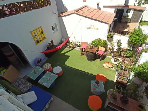 an aerial view of a miniature garden with a house at Can Cocollona in Girona