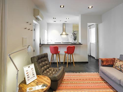 a living room with a couch and a table at ADC - Albergaria Do Calvário - by Unlock Hotels in Évora