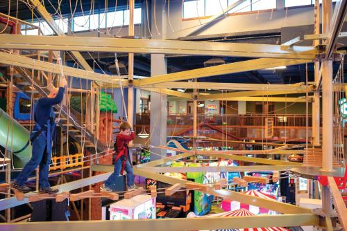 two people are onadders in a room at Club Wyndham Great Smokies Lodge in Sevierville