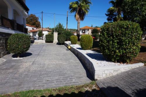 A garden outside katerina's Villa