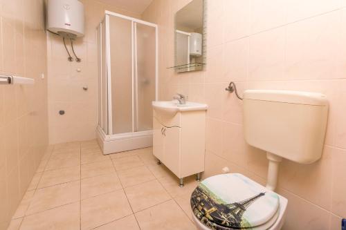 Koupelna v ubytování Apartments IvaT