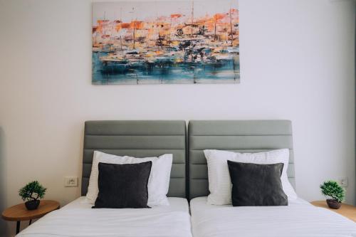 Ένα ή περισσότερα κρεβάτια σε δωμάτιο στο Luxury Apartments Stefano - Elite