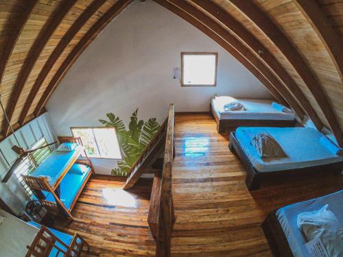เตียงในห้องที่ Bella's Backpackers Hostel