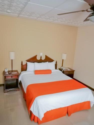 Katil atau katil-katil dalam bilik di Hotel Royal Palace