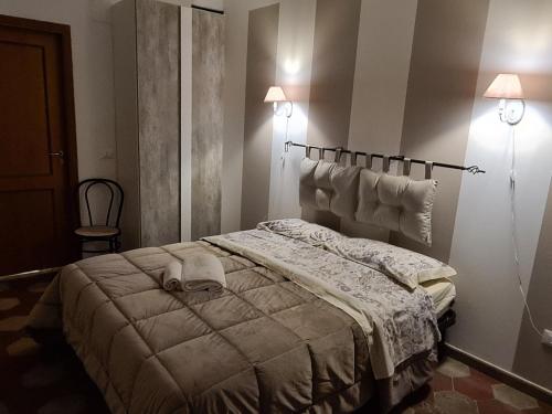 Posteľ alebo postele v izbe v ubytovaní Agorà Sant’anna Apartment