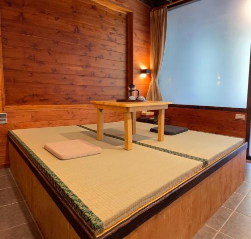 Cama ou camas em um quarto em Yun Xiang Villa 未接待12歲以下孩童