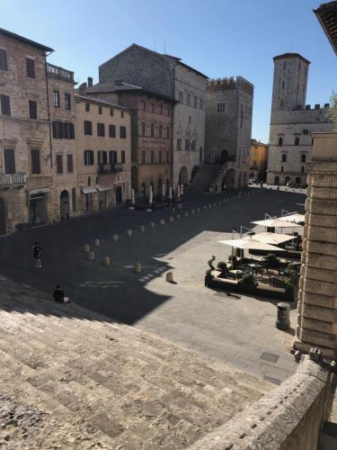 a view of a courtyard in an old building at Lemon Tree Boutique Guest House in Todi