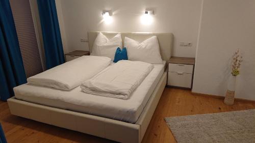 Säng eller sängar i ett rum på Hoamatl, Appartement