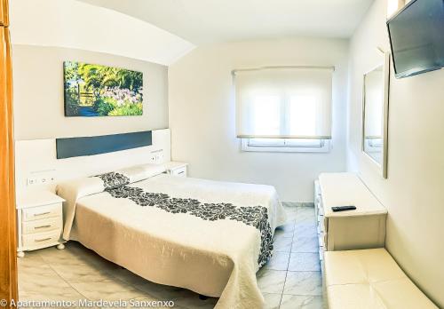 Postel nebo postele na pokoji v ubytování Apartamento Mardevela