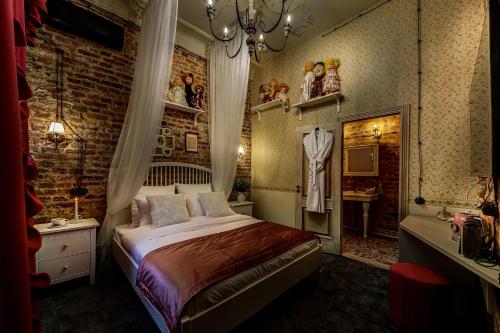 Ліжко або ліжка в номері Mysterio Hotel