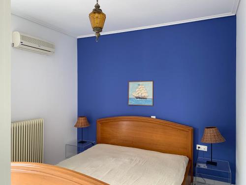 Кровать или кровати в номере Villa Kavos - Isthmia Corinth