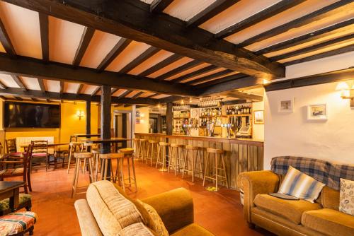 The lounge or bar area at The Hawk & Buckle Inn