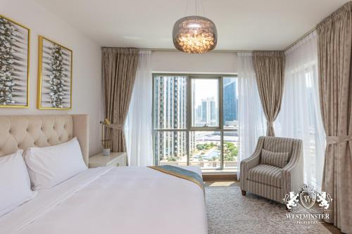 Postel nebo postele na pokoji v ubytování Westminster Boulevard Central - Burj Khalifa