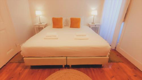 Ένα ή περισσότερα κρεβάτια σε δωμάτιο στο Chalet D´Ávila Guest House