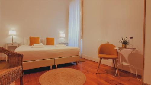 Ένα ή περισσότερα κρεβάτια σε δωμάτιο στο Chalet D´Ávila Guest House