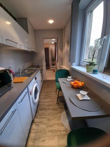 Götzer Apartman 7300 Komló, 4 Petőfi Sándor utca kép - 3
