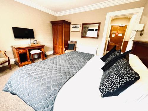 Katil atau katil-katil dalam bilik di Invergarry Hotel