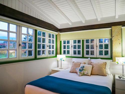 Katil atau katil-katil dalam bilik di Casa da Vinha