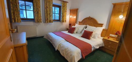 מיטה או מיטות בחדר ב-Schlosserhaus Appartements