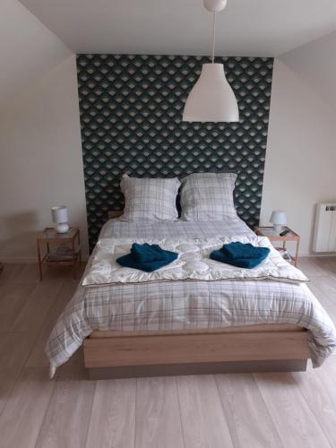 Katil atau katil-katil dalam bilik di petit coin au calme