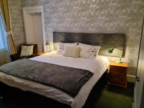 A bed or beds in a room at St.Ebba B&B 