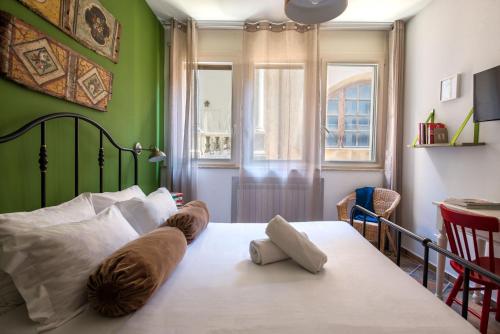 Un pat sau paturi într-o cameră la Cassaro261 B&B