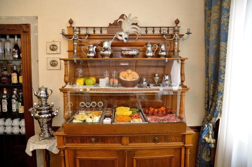 a display case with a variety of food on it at Palazzo Odoni in Venice