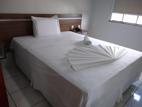 Posteľ alebo postele v izbe v ubytovaní Crystal Palace Hotel
