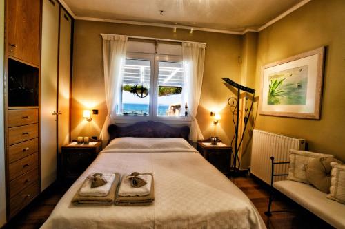 Postel nebo postele na pokoji v ubytování Luxurious Villa by the sea