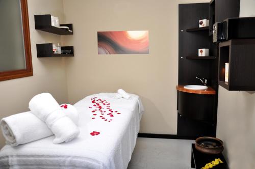 Postel nebo postele na pokoji v ubytování Monasterio Hotel Boutique