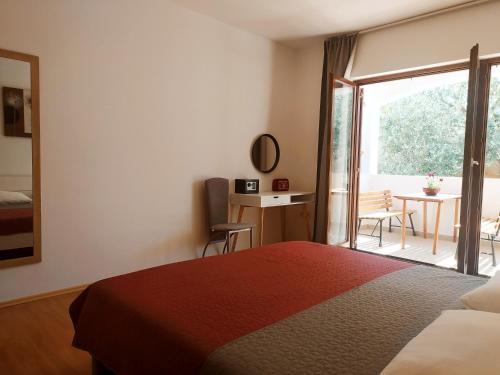 Posteľ alebo postele v izbe v ubytovaní Apartament Oliva