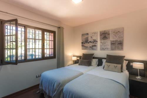 Giường trong phòng chung tại Finca Horno de la Teja
