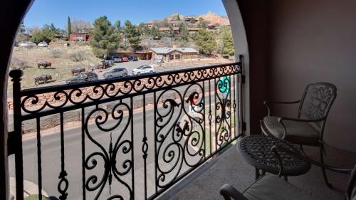 a view from a balcony of a balcony with a view of the city at Best Western Plus Arroyo Roble Hotel & Creekside Villas in Sedona