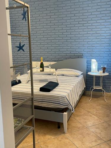 Postel nebo postele na pokoji v ubytování QuamMare