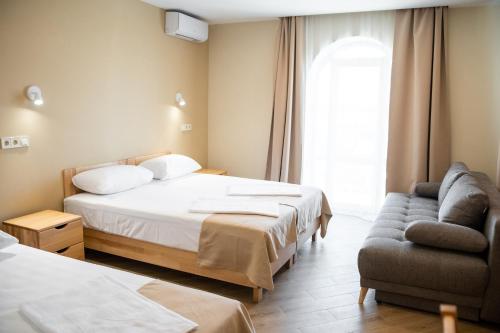 Кровать или кровати в номере Ruta Resort & Event Hotel
