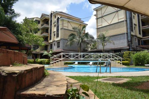 The swimming pool at or close to KenGen Furnished and Serviced Apartments