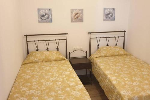 Ένα ή περισσότερα κρεβάτια σε δωμάτιο στο Παραδοσιακό σπίτι εντός της Χώρας της Ίου