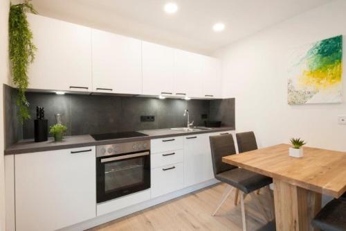 Una cocina o zona de cocina en Armea Appart