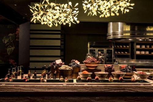 a buffet of cupcakes and desserts on a table at Park Hyatt Hotel and Residences, Hyderabad in Hyderabad