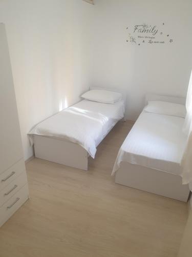 Postel nebo postele na pokoji v ubytování Apartment Ivano
