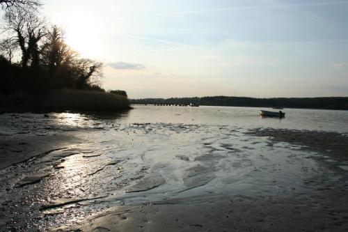 a boat in the water on a lake at BnB Thuroe in Svendborg