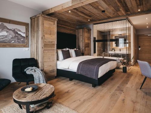 Postel nebo postele na pokoji v ubytování VAYA Zillertal inklusive Gästekarte Erste Ferienregion Zillertal